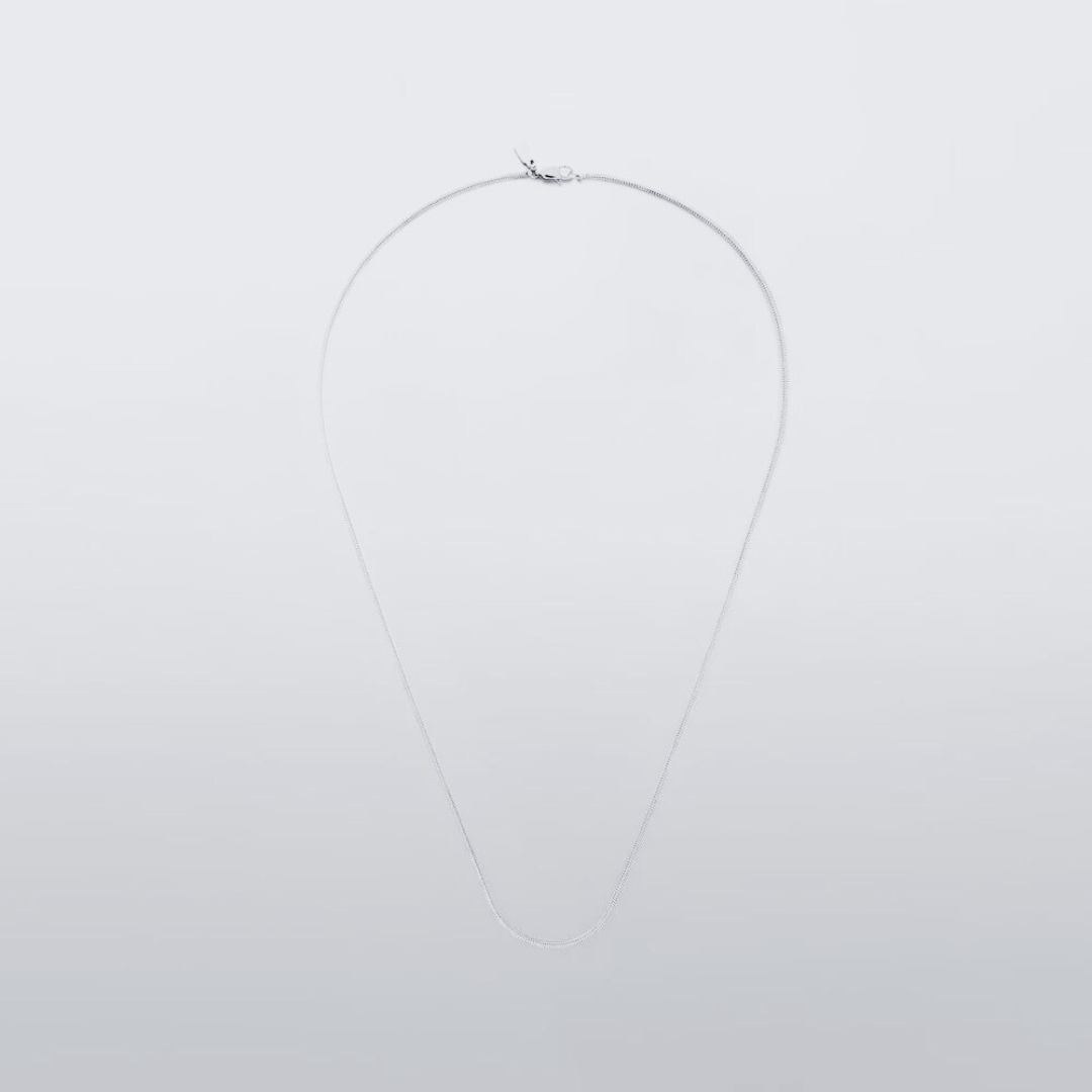 Fine snake chain necklace laid out in full