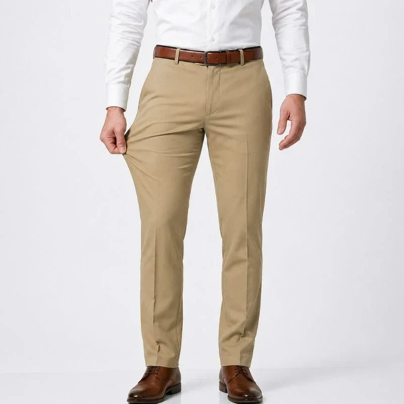 Khaki slim-fit stretch dress pants with a white shirt and brown belt, front view