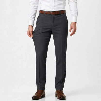 Slim-fit stretch dress pants in a dark gray shade, front view