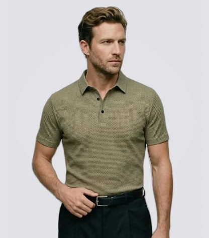 Man wearing a khaki basketweave knit polo shirt with dark trousers