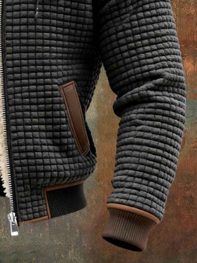 Elbow patch and ribbed cuff of the waffle knit jacket