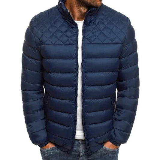 Man wearing a navy blue quilted-yoke puffer jacket