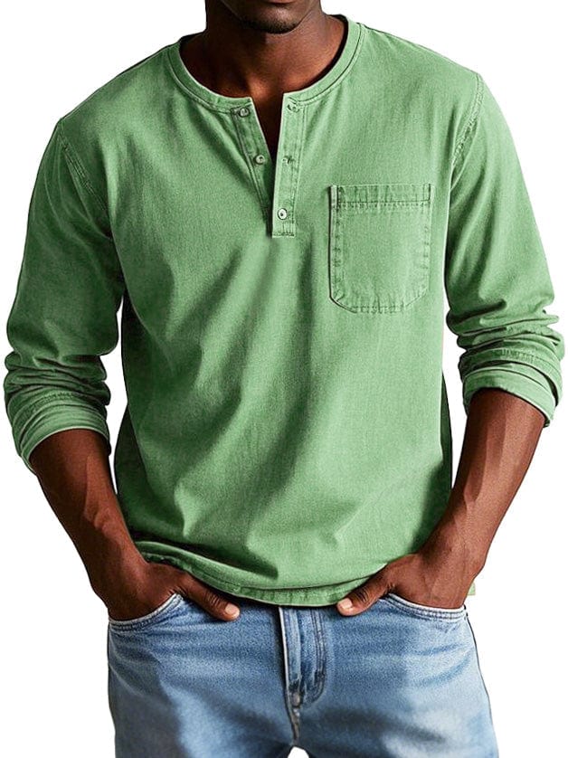 Man wearing a green chest pocket henley shirt