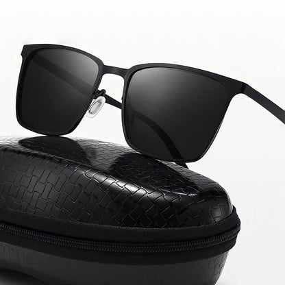 Close-up of square metal frame sunglasses on a zip case