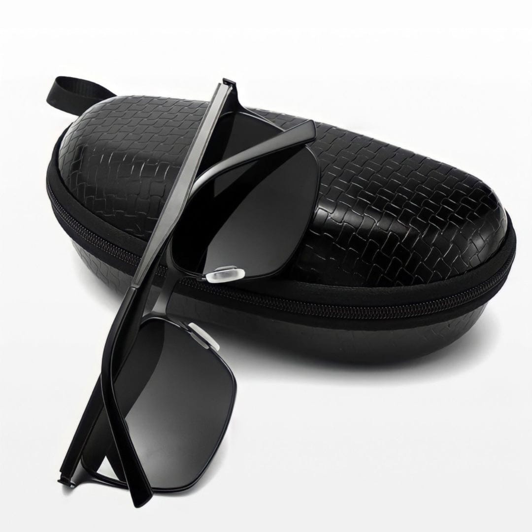 Square metal frame sunglasses folded on a zip case