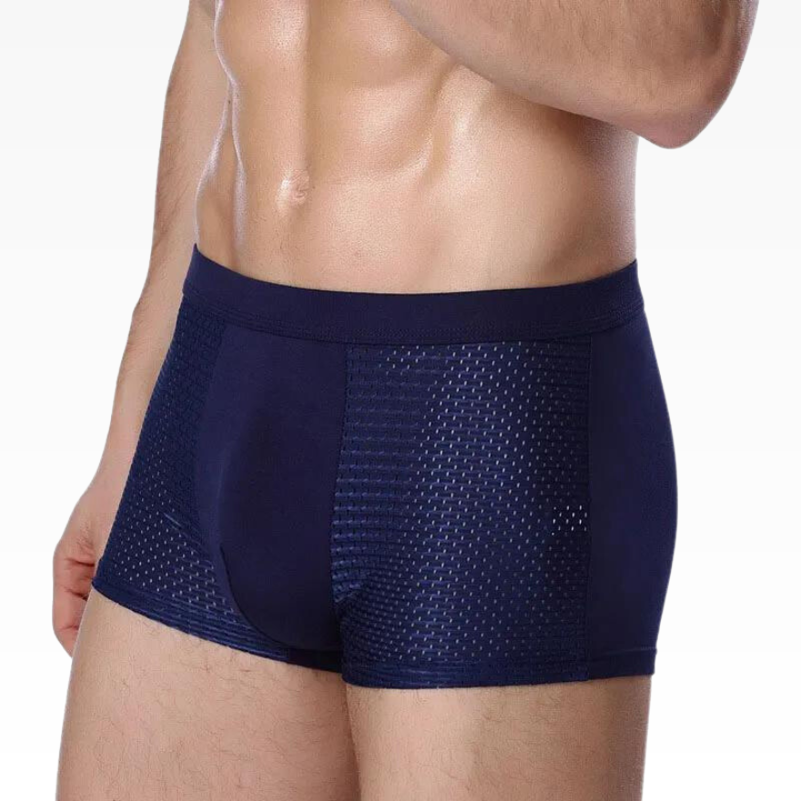 Man wearing navy mesh boxer briefs