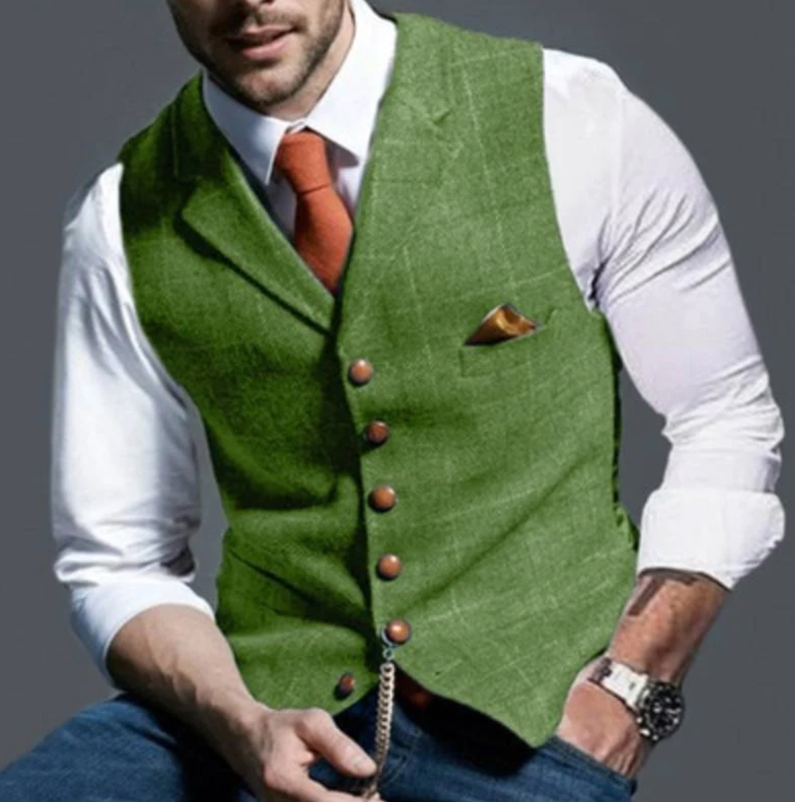 Green notch-lapel plaid vest worn over a white shirt and tie