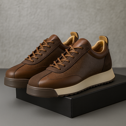 Pair of brown perforated lace-up sneakers