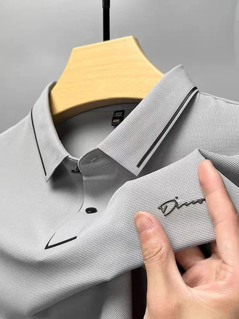 Gray waffle-knit polo shirt with tipped collar and curved placket