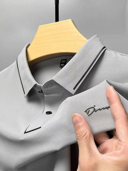Gray waffle-knit polo shirt with tipped collar and curved placket