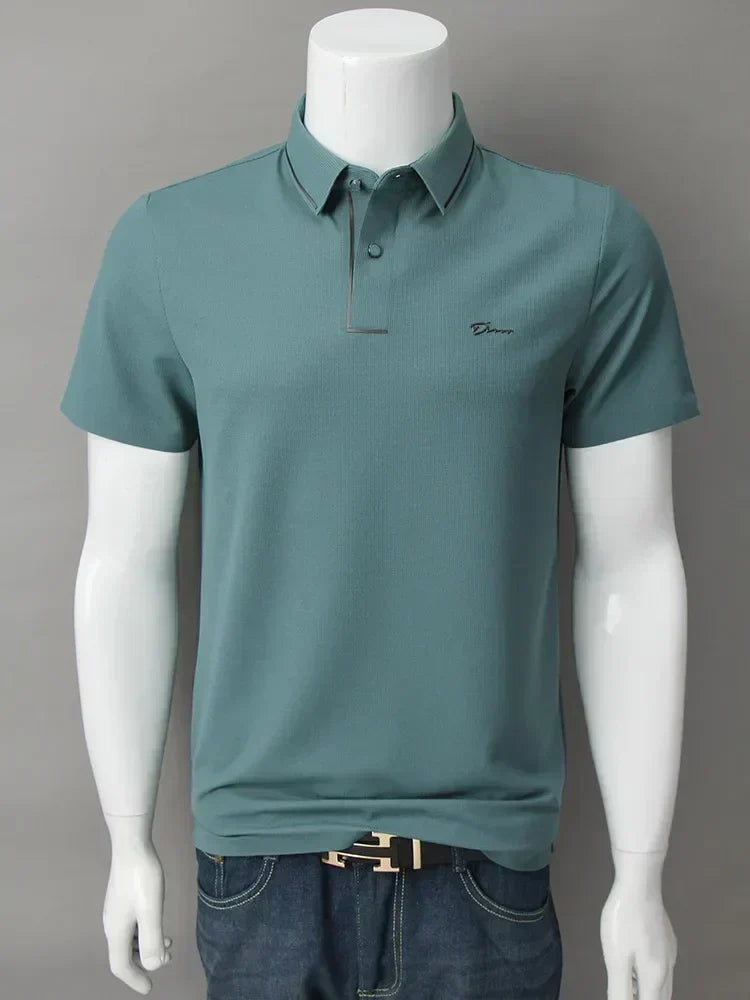 Green waffle-knit polo shirt with short sleeves and tipped collar, front view