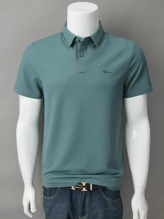 Green waffle-knit polo shirt with short sleeves and tipped collar, front view