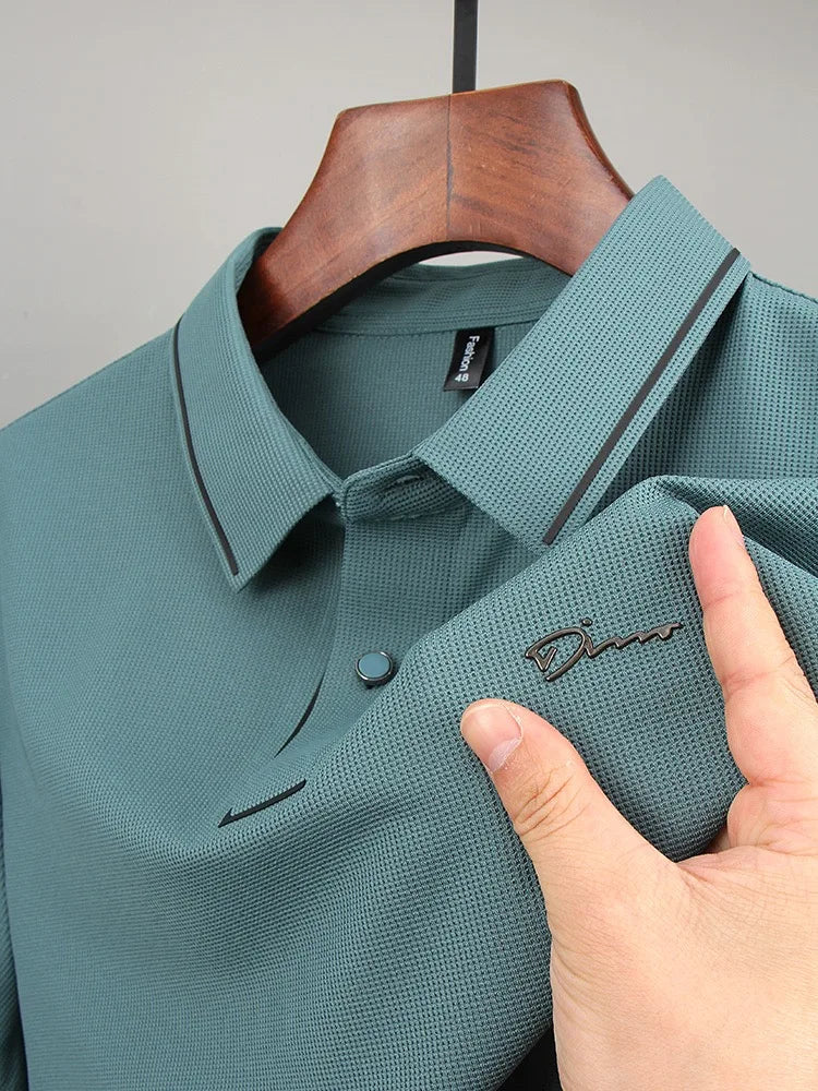 Green waffle-knit polo shirt close-up of placket and button