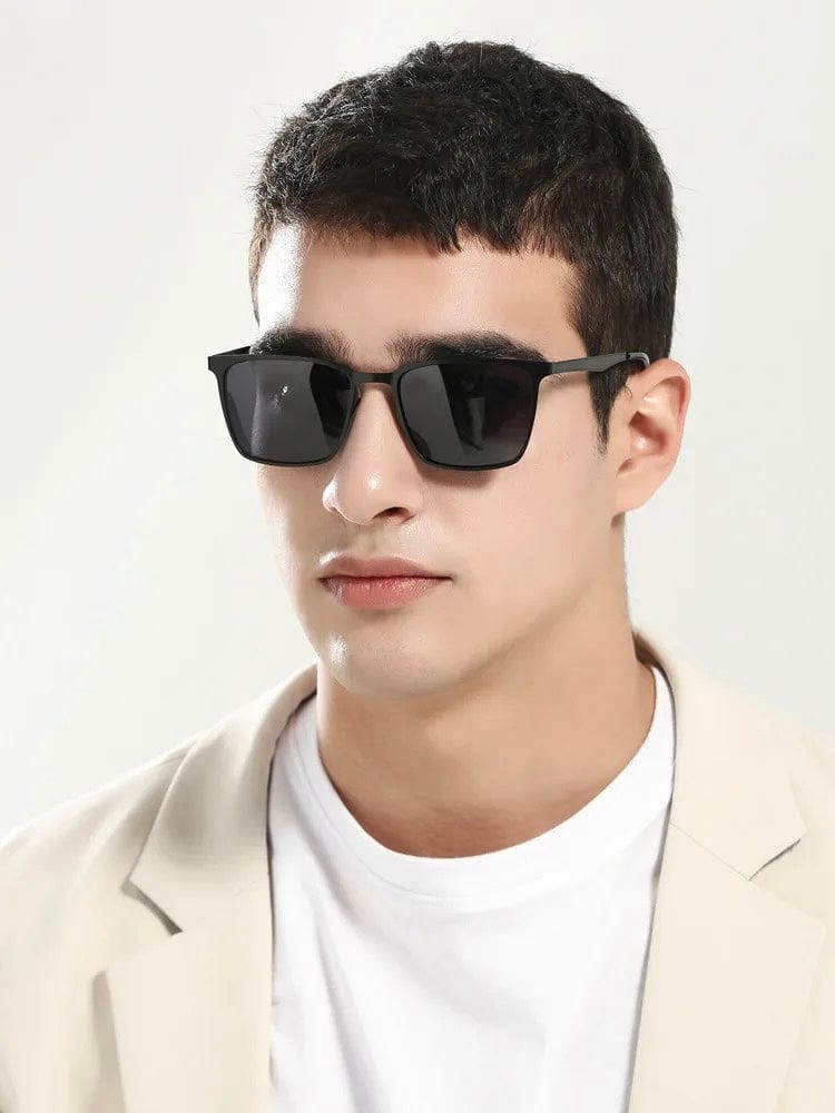 Side view of square metal frame sunglasses on a man