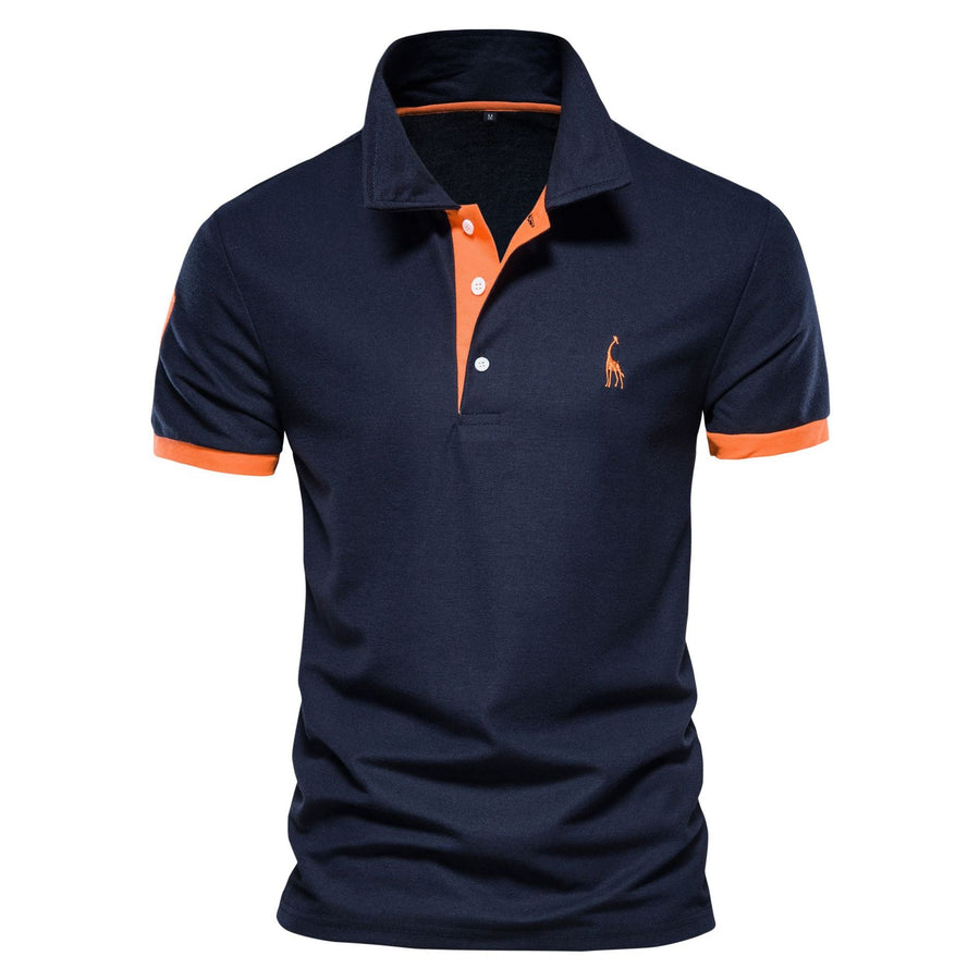 Navy blue contrast-trim polo shirt with orange placket and orange sleeve bands, front view