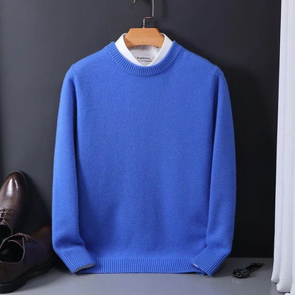 Blue fine-knit crew neck sweater on a hanger