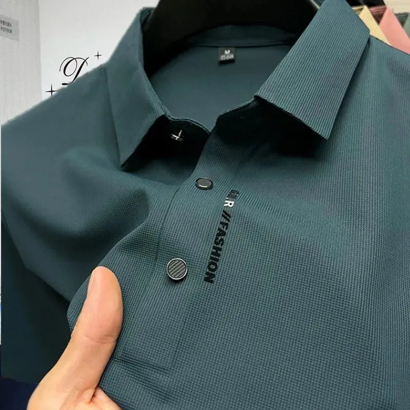 Dark teal waffle knit polo shirt, close-up