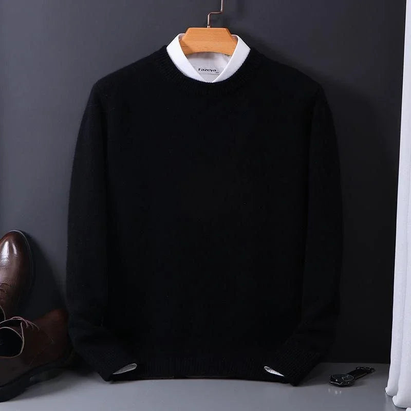 Black fine-knit crew neck sweater on a hanger