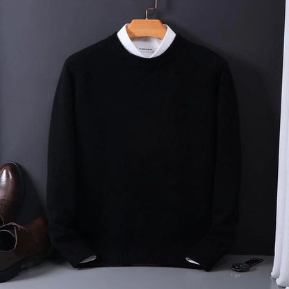 Black fine-knit crew neck sweater on a hanger