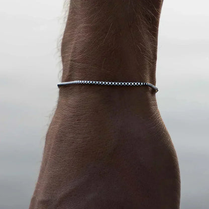 Box chain bracelet worn on the wrist