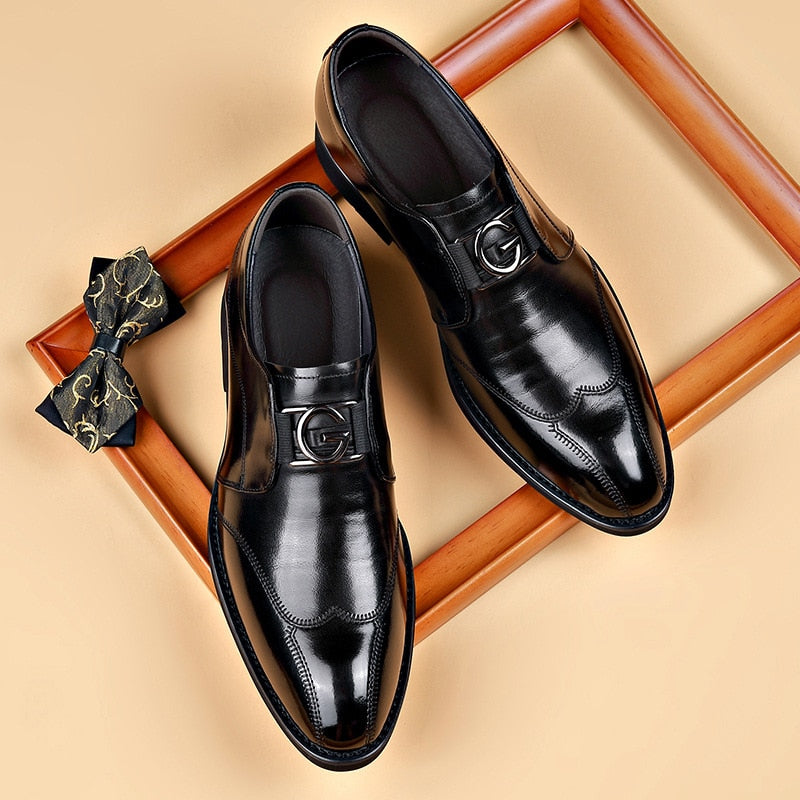 Black wingtip bit loafers seen from above