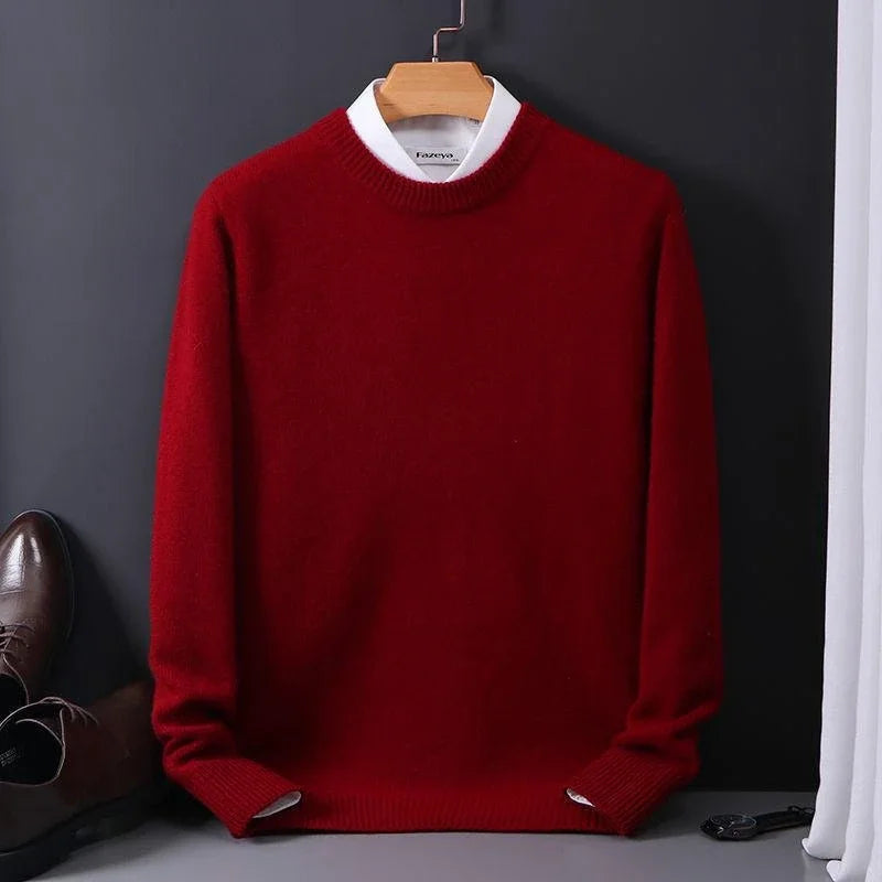 Rust red fine-knit crew neck sweater on a hanger
