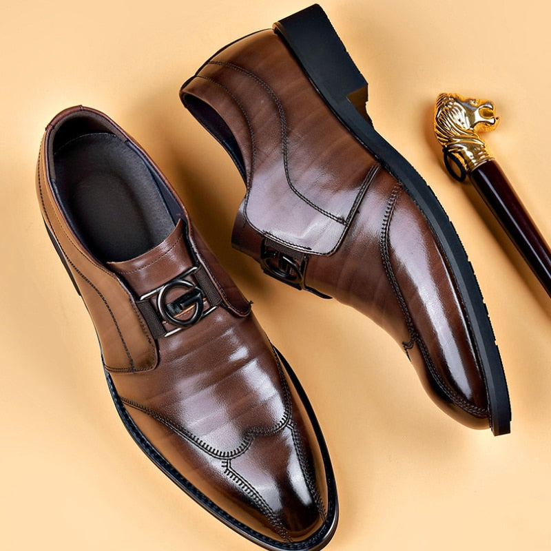 Brown wingtip bit loafers seen from the side and from above