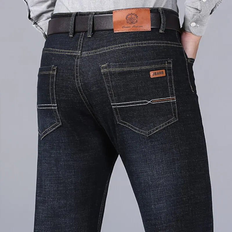 Black slim-fit five-pocket jeans, back view