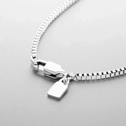 Lobster clasp and tag of the fine box chain necklace