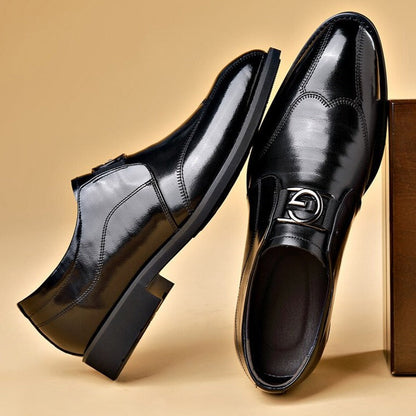 Black wingtip bit loafers with a high-shine finish