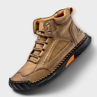 Brown lug-sole stitched ankle boot