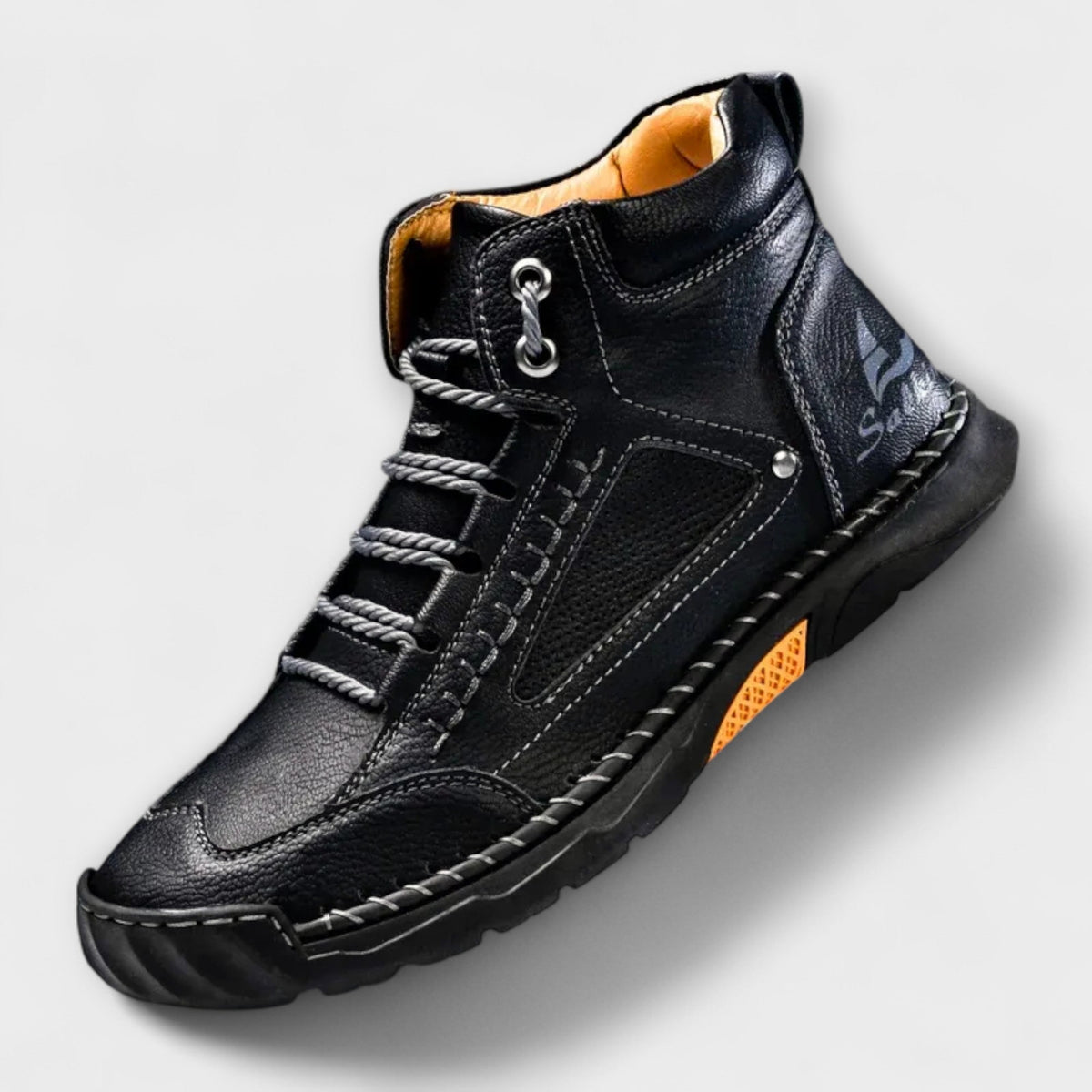 Black lug-sole stitched ankle boot