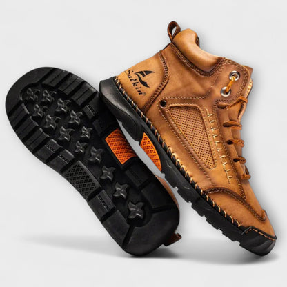 Lug sole of the tan ankle boots