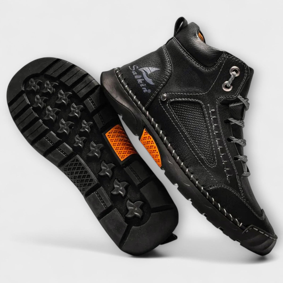 Lug sole of the black ankle boots