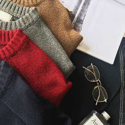 Elbow-patch crew neck sweaters folded