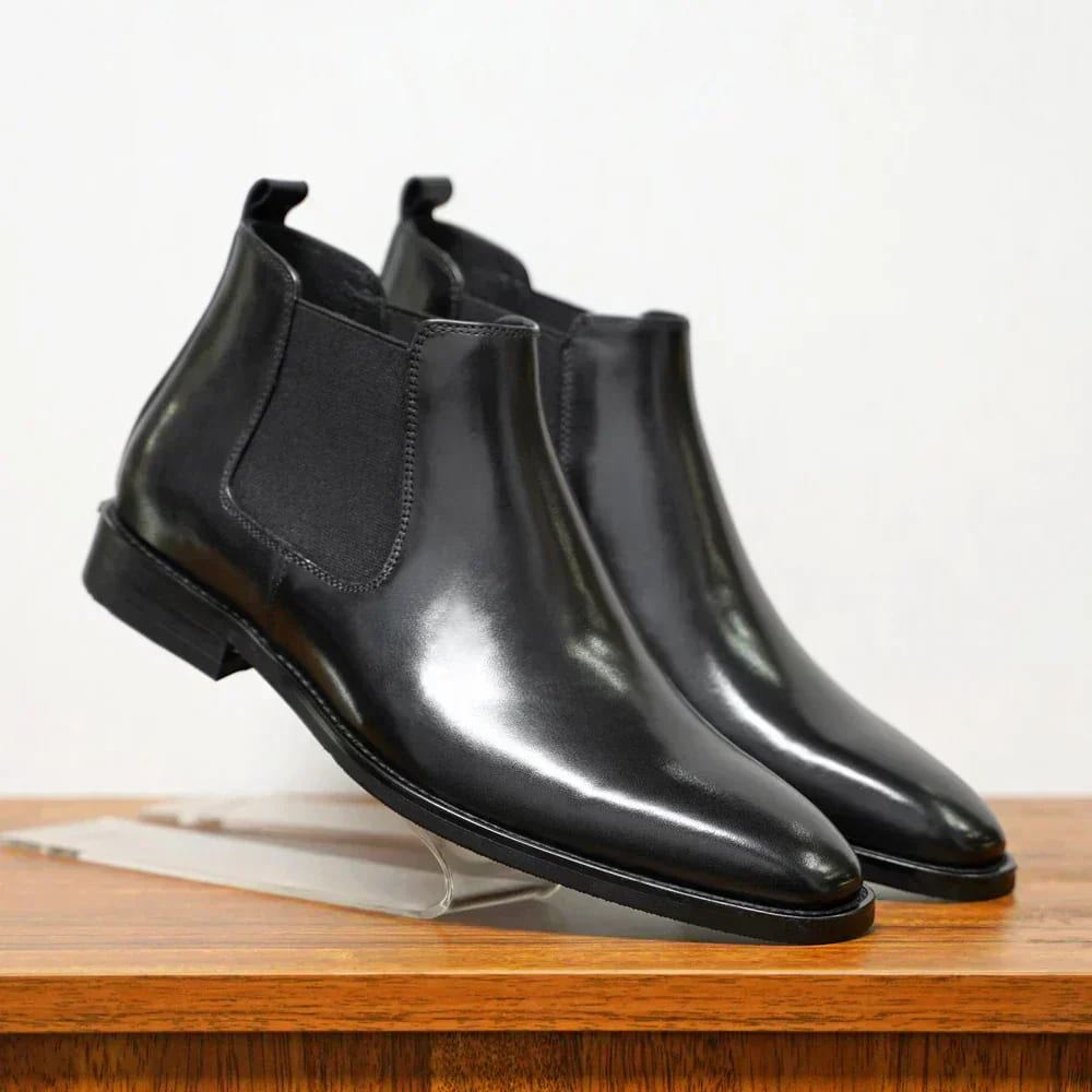 Black plain-toe Chelsea boots