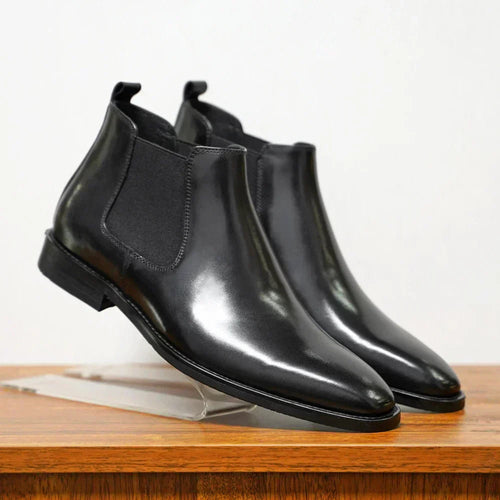 Black plain-toe Chelsea boots