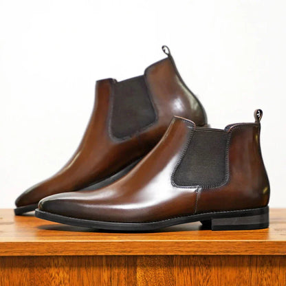 Pair of brown plain-toe Chelsea boots