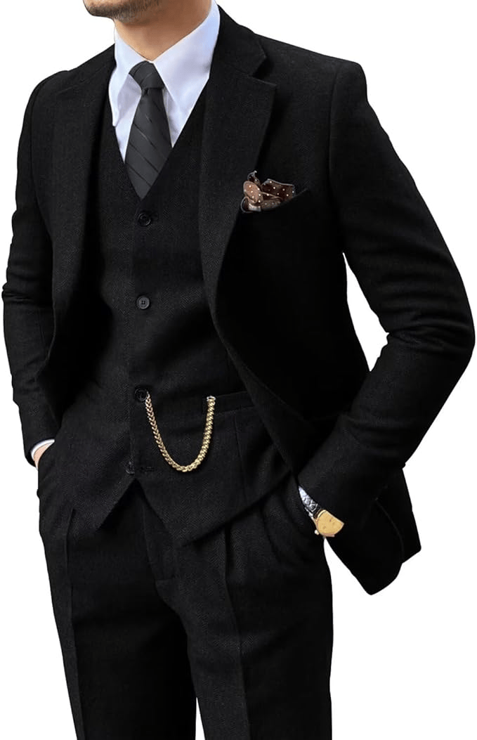 Man wearing a black herringbone notch-lapel suit