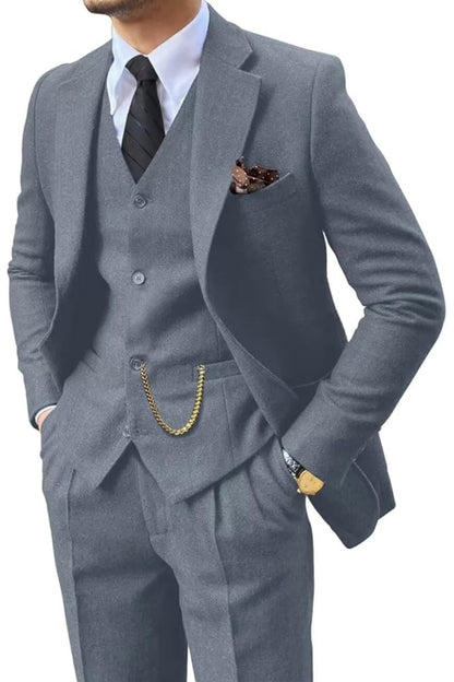 Man wearing a denim blue herringbone notch-lapel suit