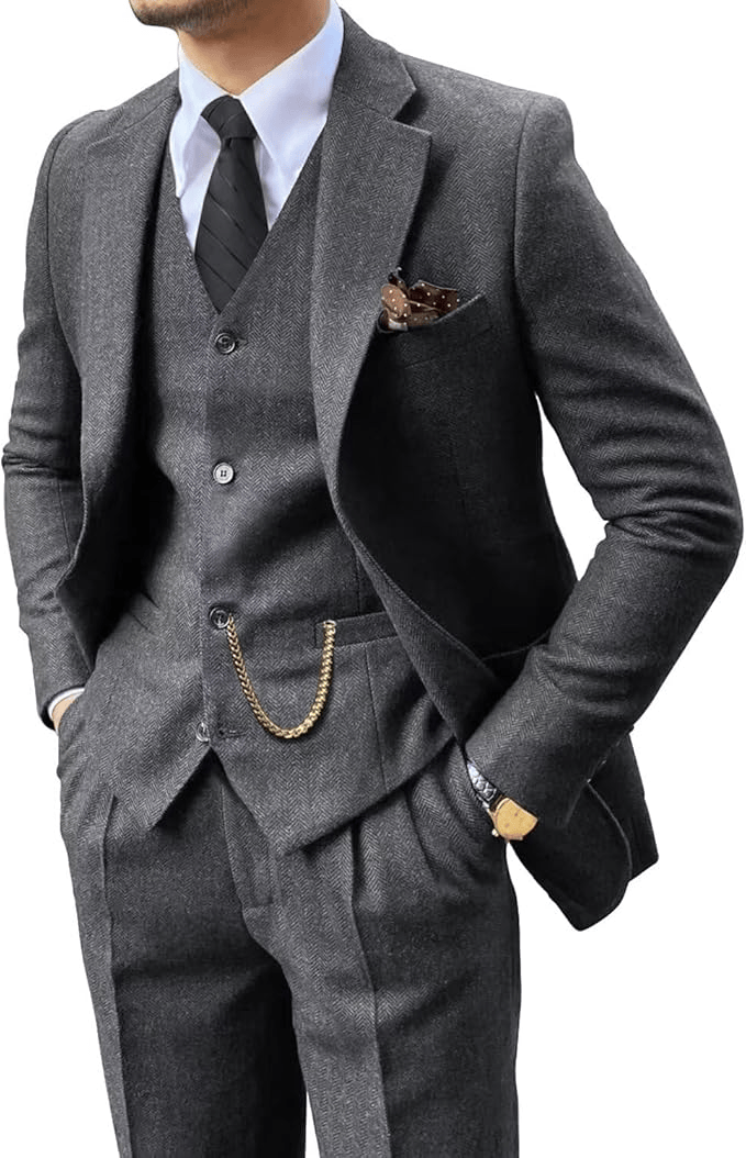 Man wearing a gray herringbone notch-lapel suit