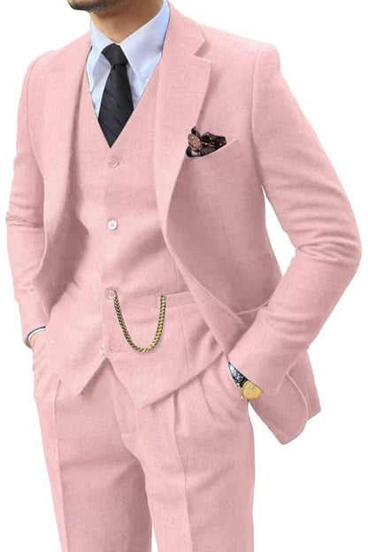 Man wearing a pink herringbone notch-lapel suit